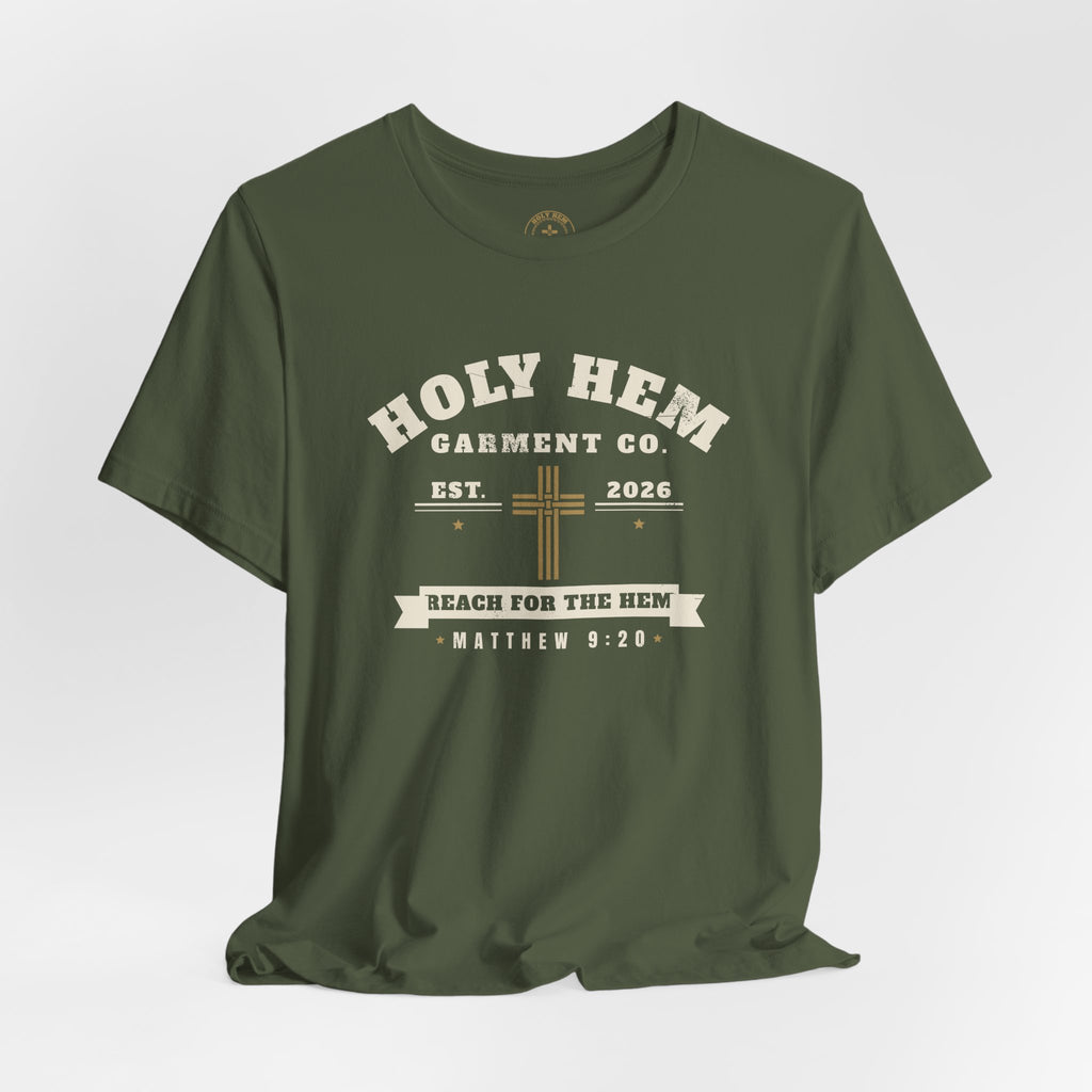 Holy Hem Garment Co. T-Shirt – Vintage Cross Badge Matthew 9:20 Tee