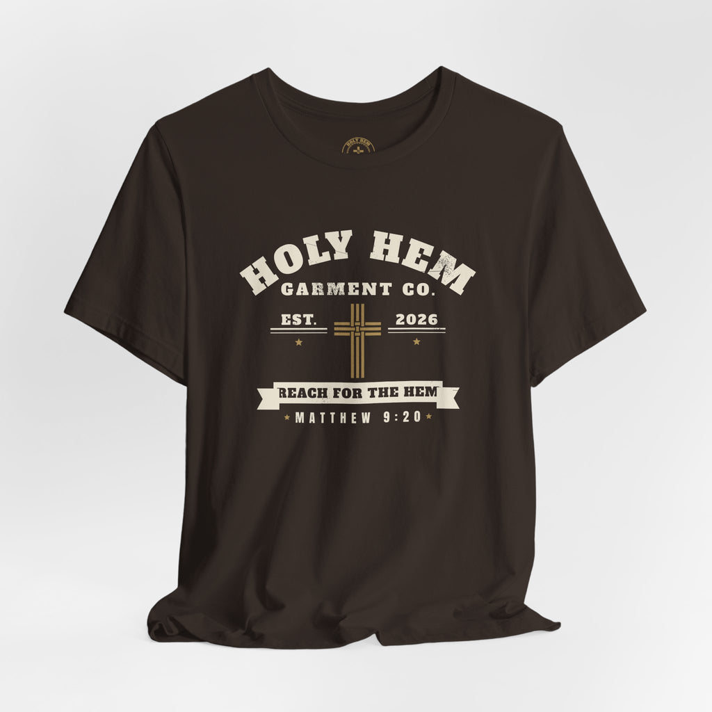 Holy Hem Garment Co. T-Shirt – Vintage Cross Badge Matthew 9:20 Tee