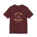 Be Still T-Shirt – Holy Hem Collegiate Crest Psalm 46:10 Christian Tee